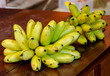 © CasanoWa Stutio - Bananas on wooden table
