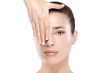 Wall Mural - beautiful spa girl with hand on her face. skincare concept