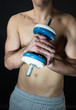 © Maria Vazquez - Muscular man with dumbbells