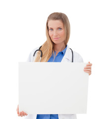 Wall Mural - Nurse / doctor showing blank board / sign.