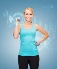 Poster - young sporty woman with light dumbbells