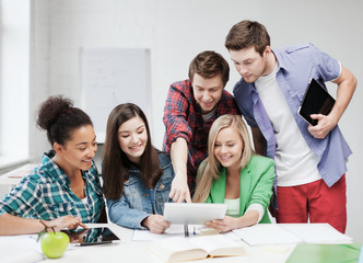 Poster - students looking at tablet pc at school