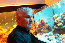 Senior Man At Oceanarium