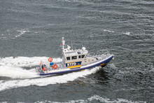 NYPD Boat Cruising Through Harbor