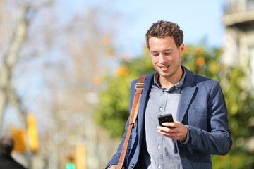 Wall Mural - young urban businessman professional on smartphone