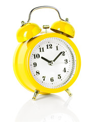 Wall Mural - yellow alarm clock isolated on white background