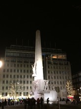 National Monument In Amsterdam, Netherlands At Night