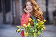 © ZoomTeam - sensual brunette girl sitting on bicycle with some spring flower
