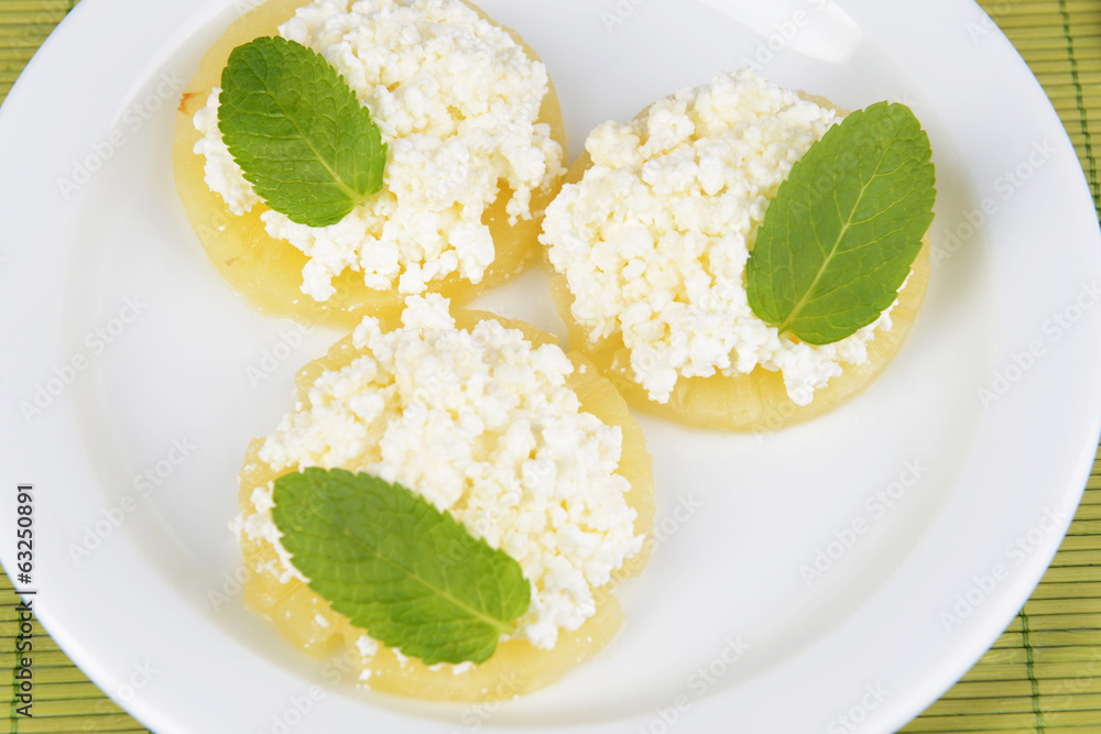 Tasty pineapple with cottage cheese, close up