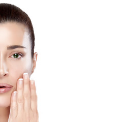 Wall Mural - beautiful spa girl with hand on her face. skincare concept