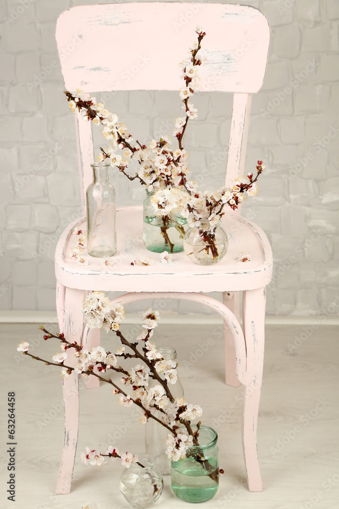 Beautiful apricot blossom in transparent jars