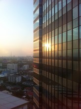 Sunset On High Building Mirror 
