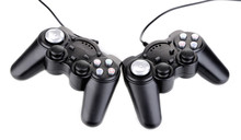 Black Game Controllers Isolated On White