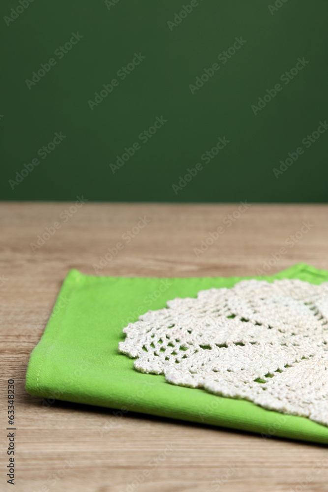Background with wooden table and tablecloth