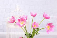 Beautiful Pink Tulips On Grey Wall Background