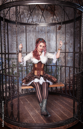 Obraz na płótnie canvas czteroczęściowy "tetraptyk" Piękna steampunk kobieta w klatce