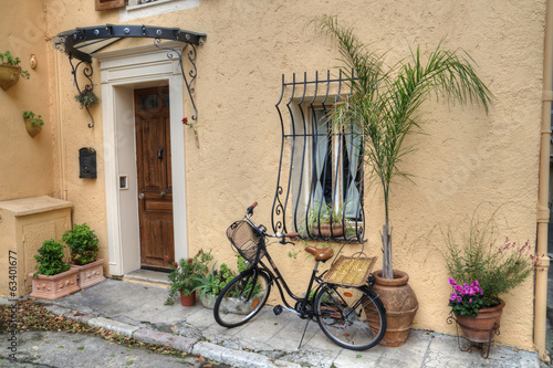 Fototapeta na wymiar Bicycle outside House, France