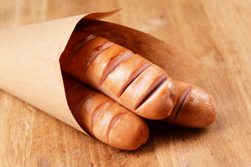 Poster - Grilled sausage on table close-up