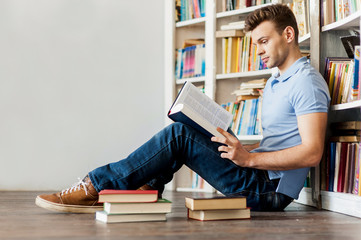 Young man in library.