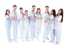 Group Of Cheerful Doctors Showing Thumbs Up