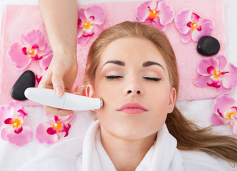 Woman Getting Microdermabrasion Treatment