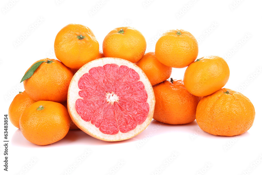 Ripe sweet tangerines and grapefruit, isolated on white