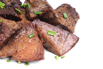 Fried pork liver with green onion isolated on white