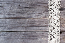 Lace On Old Wood Background