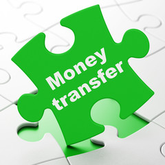 Business concept: Money Transfer on puzzle background