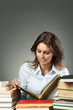 © captblack76 - Beautiful woman relaxing with books