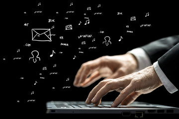 Wall Mural - businessman typing on a computer keyboard