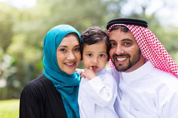 Wall Mural - young Arabian family portrait outdoors