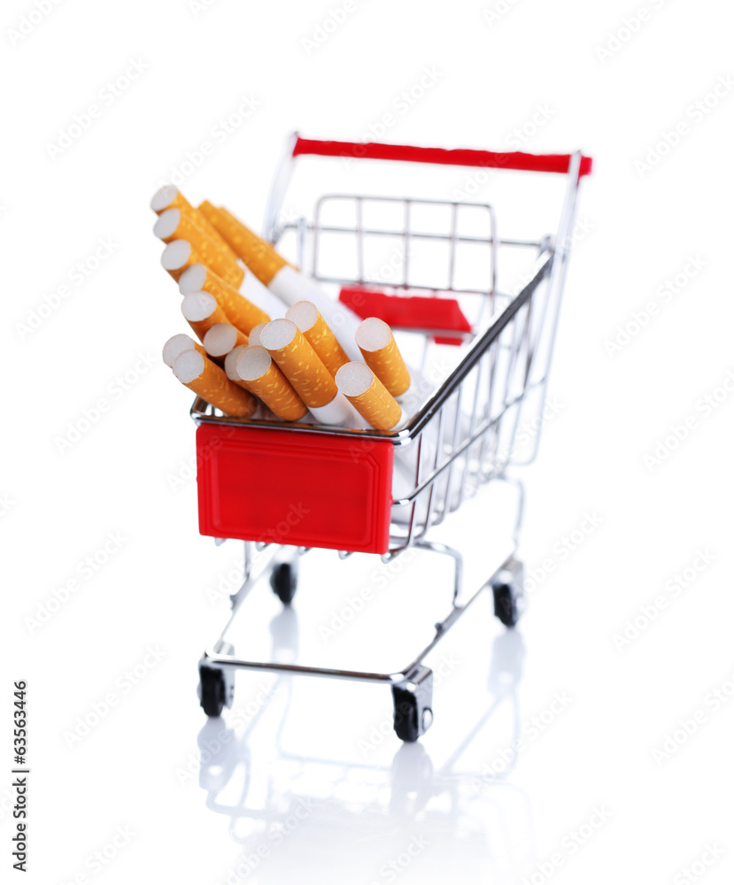 Cigarettes in shopping cart isolated on white
