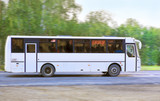 Fototapeta  - bus goes on the highway
