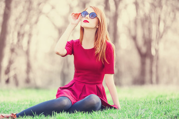 Sticker - Redhead women  in a park