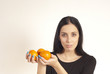 © drapet79 - Beatiful girl holding oranges in hands
