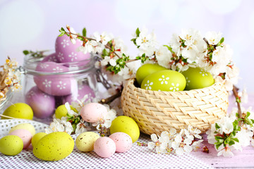 Wall Mural - Composition with Easter eggs in glass jar and wicker basket,