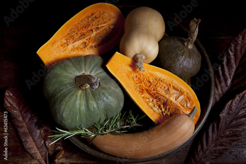 Fotografie, Obraz variety of pumpkins with rustic autumnal background