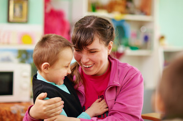 cheerful kids with disabilities in rehabilitation center