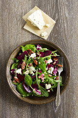 Wall Mural - Salad with beet, blue cheese, nuts and vinaigrette.