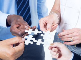 Sticker - Group of Business People Building Jigsaw