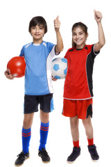 Wall Mural - two children soccer players showing sign ok