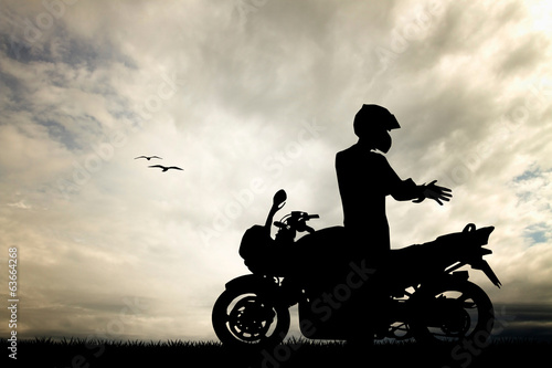 Obraz w ramie motorcyclist at sunset