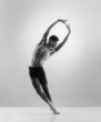 © Acronym - A sporty and athletic ballet dancer. Black and white image.