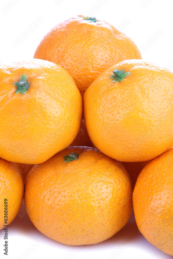 Ripe sweet tangerines, isolated on white