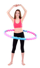 Wall Mural - Woman doing exercises with hula hoop isolated on white