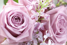 Bouquet Of Roses And Lilacs