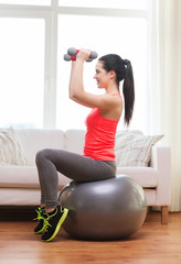 Sticker - smiling girl exercising with fitness ball