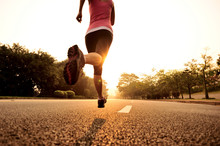Runner Athlete Running On Road