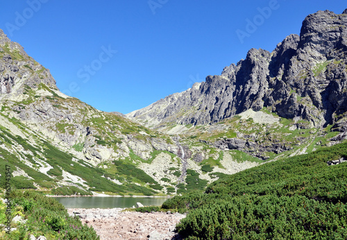 Board z aluminiowym obramowaniem Wysokie Tatry i jezioro, Słowacja, Europa
